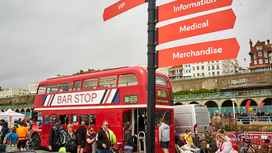 london routemaster bus converted into a bar at the finish village in brighton