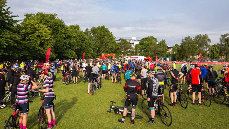 crowd gather on clapham common for the start of london to brighton bike ride