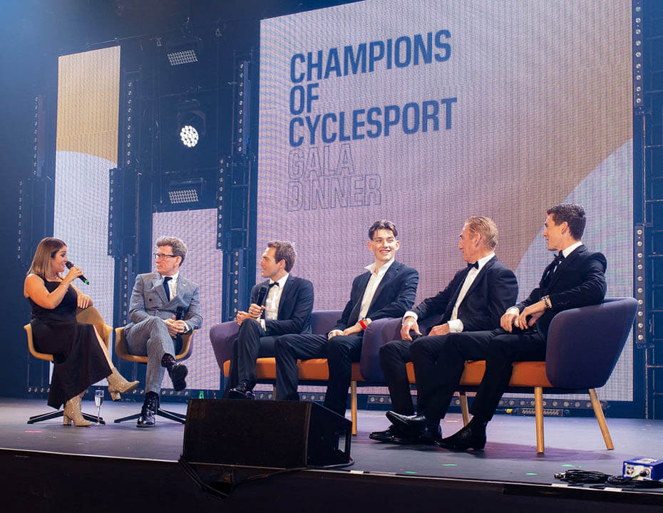 Champions Alex Dowsett, Josh Tarling, Sean Kelly and Yanto Barker on staging being interviewed