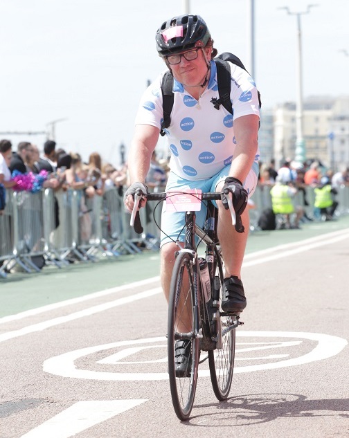 Lewis Coghlin, Director of Fundraising, on his bike