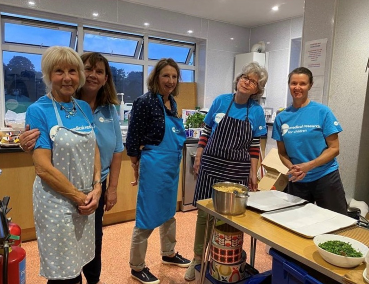 Tiverton Committee working hard backstage in the kitchen at their Rugby Quiz Night.