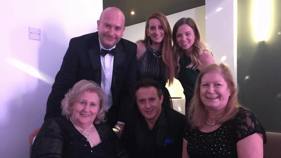 Members of the Peterborough Committee pose with Jimmy Constable from 911.