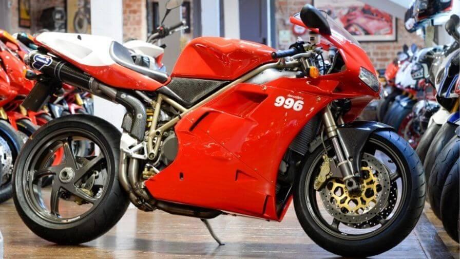red ducati 996 in a showroom