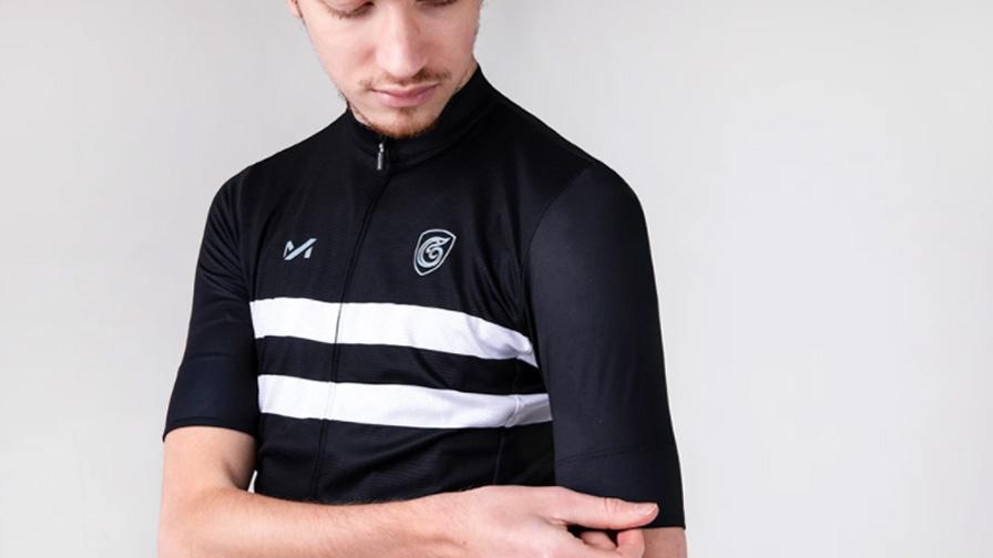 man posing in cycling jersey