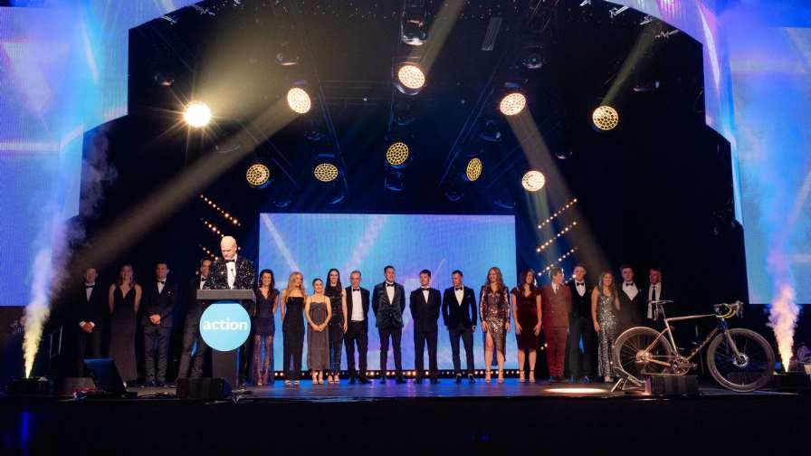 Image of Cycling champions on stage