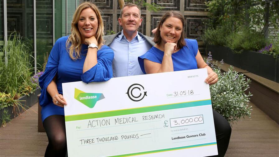 Landlease presenting a £3000 check to Action