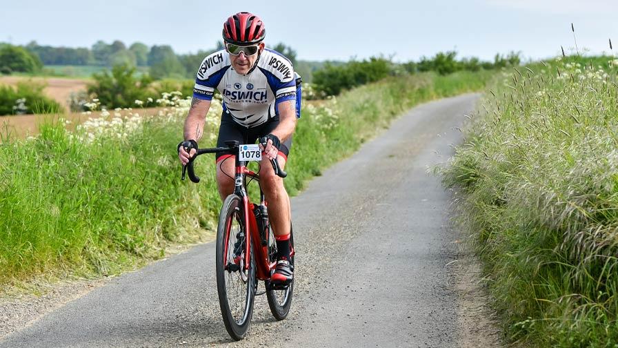 ipswich cycling club member riding along country road