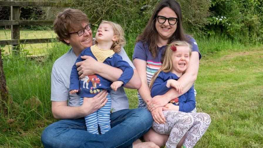 Picture of Emmy and family