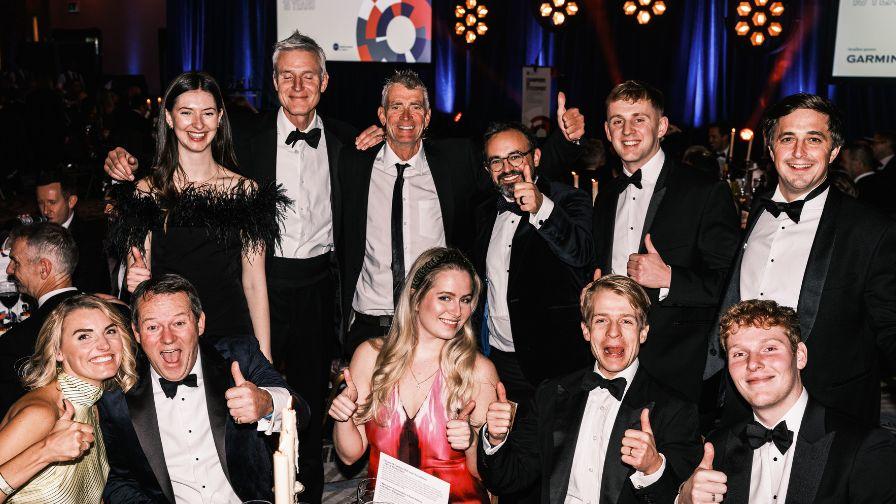 A table of guests sat at a dinning table