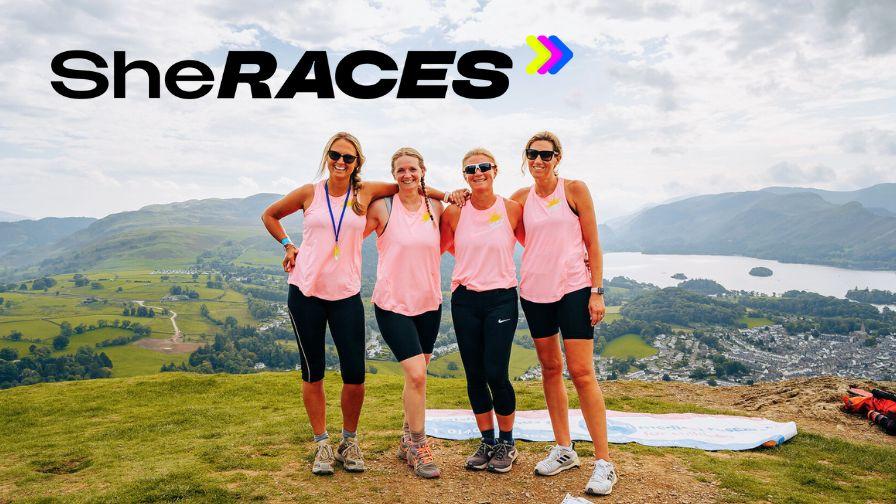 womens team on mountain summit