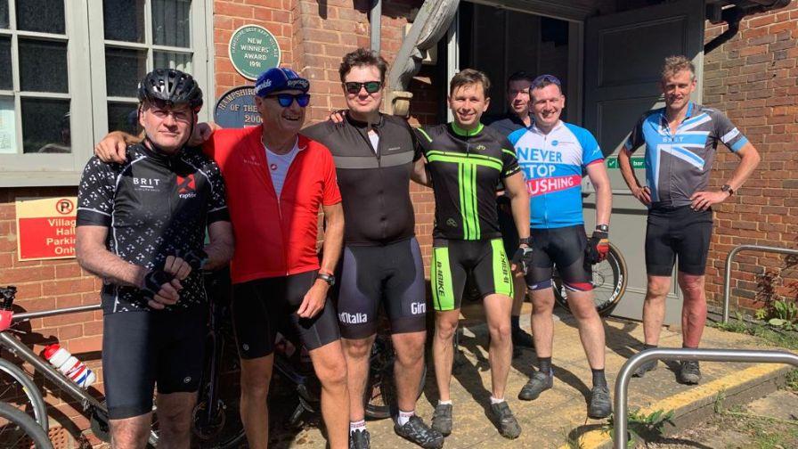 Group of cyclists having a break