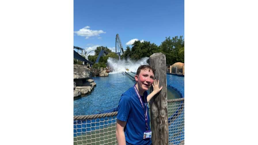 Image of Tom at a theme park