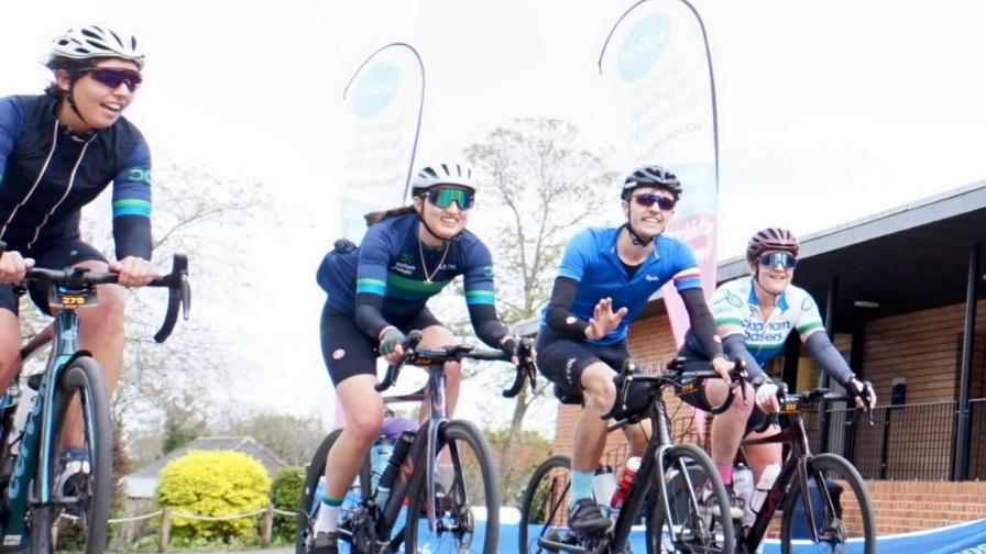 Group of cyclists riding in a line