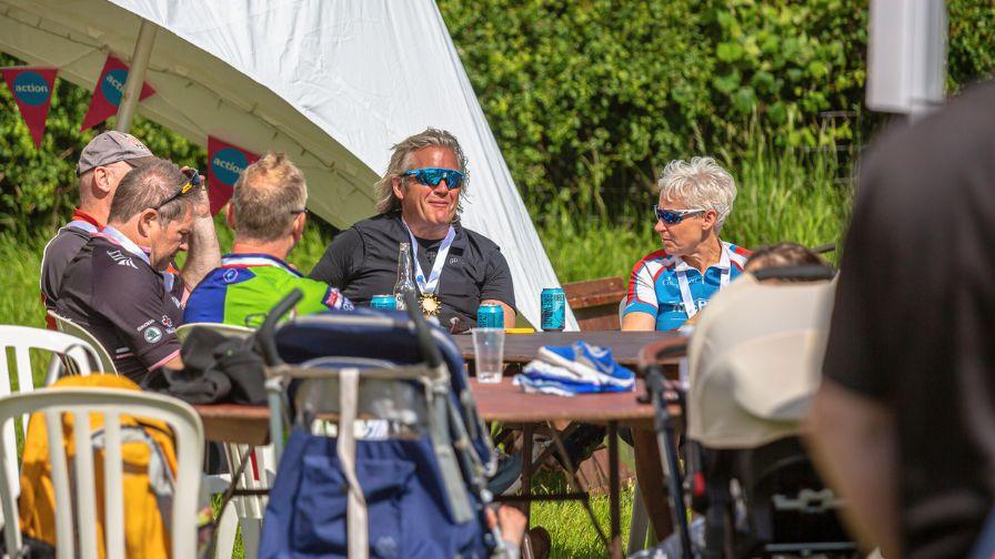 participants celebrate post-event with a drink