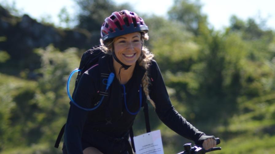 Woman smiling on cycling route