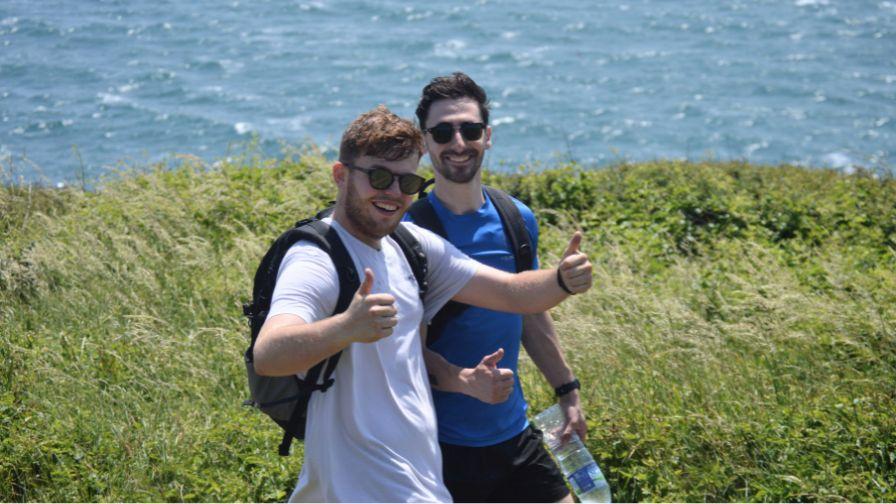 walkers with thumbs up