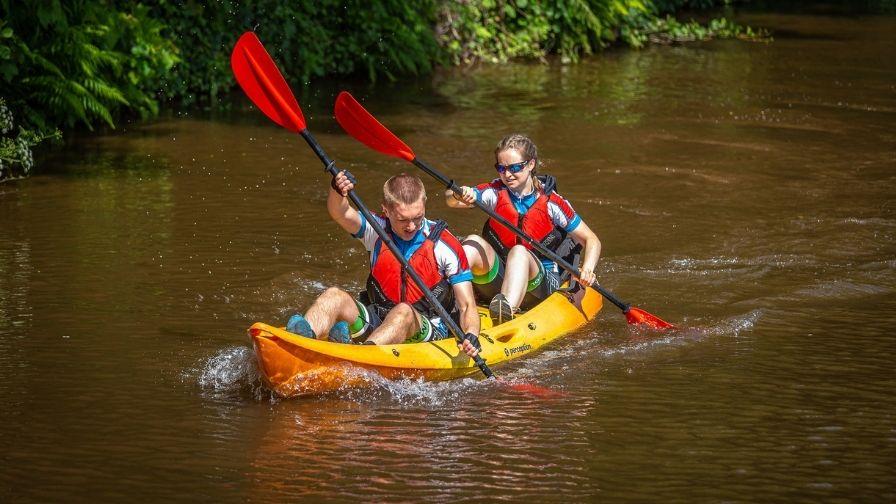 couple paddling on kayak
