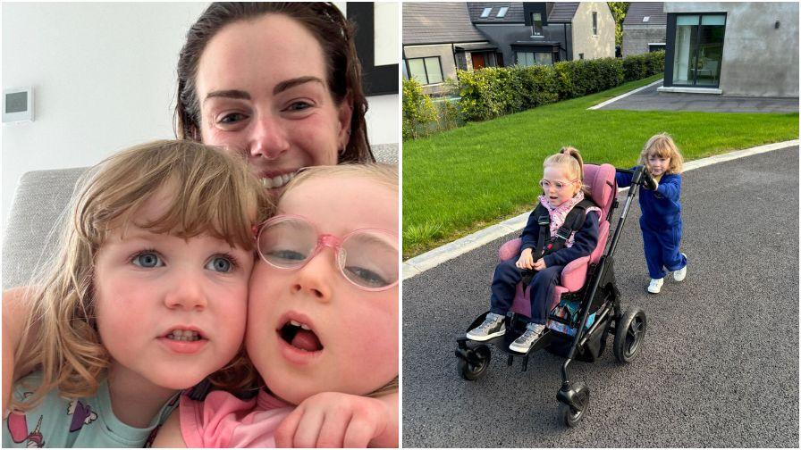 Two photos of Mollie. In one she is being hugged, cheek to cheek, by her little sister. Her mum is in the background. In the other, her little sister is pushing her in a buggy with a pale pink seat.