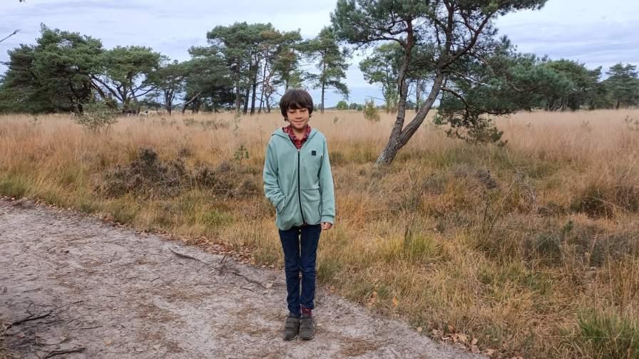 Image of boy standing on path