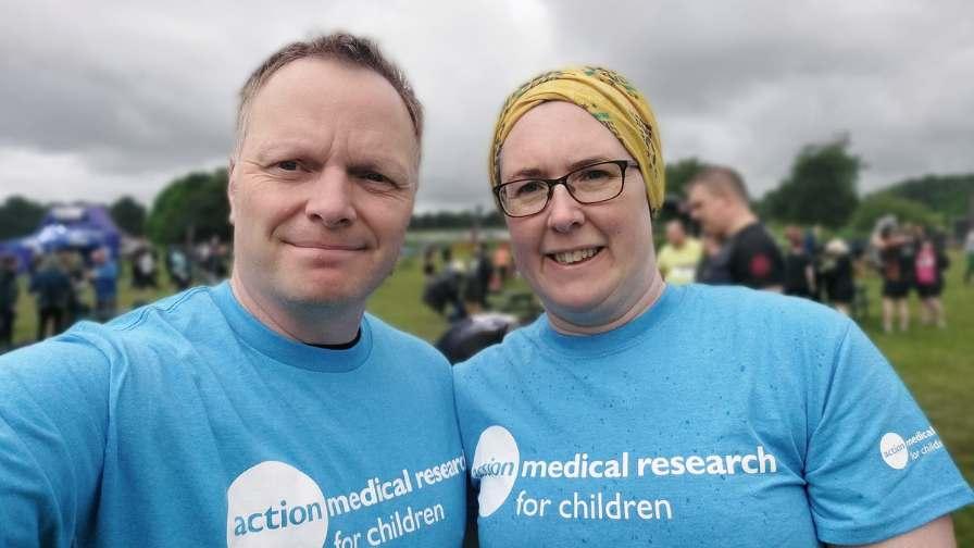 Image of Liz and Phil wearing charity t shirts