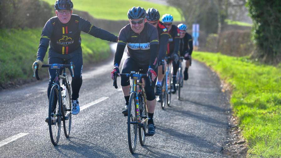 group of cyclists mid route