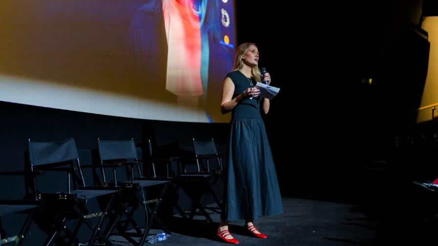 Sophie talking at a work conference in recent years