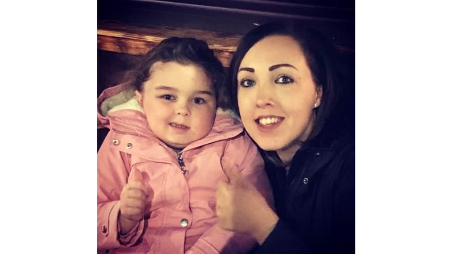 Image of mother and daughter smiling