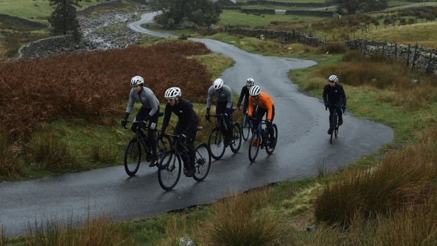 A group of cyclists on a country lane