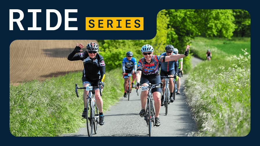 Cyclists waving happily while riding on a rural road, with "RIDE SERIES" displayed in bold text above the photo.