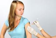 Teenage girl receiving an injection