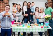 A group of neighbours holding a bake sale