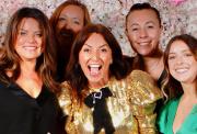 Davina McCall with a group of guests at Dine with Davina 2023