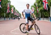 Mark Beaumont on his bike in London