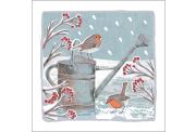 Two robins perched on a watering can surrounded by snowy winter branches with red berries.