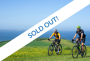 cyclists riding along the jurassic coast clifftops