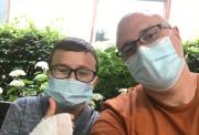 Image of Luke and his dad wearing COVID face masks