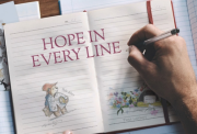 Hope in Every Line - shows a hand drawing a sketch on a pile of paper alongside other sketches