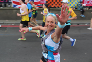 Woman runner waving