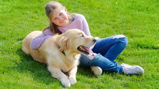 Matilda cuddling her dog