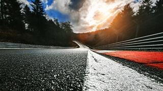 View down a race track as the sun sets