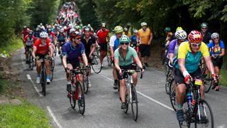 mass group of cyclists of closed roads