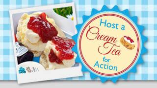 Cream team at home logo badge and a picture of scones with cream and jam