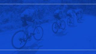 Four riders cycling up a hill, tinted blue to match the Catalyst colours