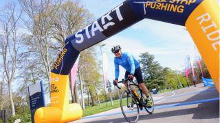 cyclist crossing the start line on ride wessex downs