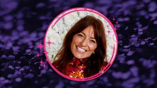 A vibrant banner with a glittery purple background, featuring a circular inset of a smiling Davina McCall framed with a pink sparkly border.