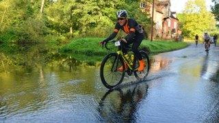 Cyclist going through water on the route
