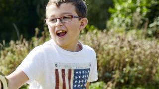 Joey playing in a garden